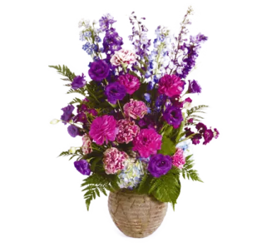 Lush Arrangement in Rustic Urn